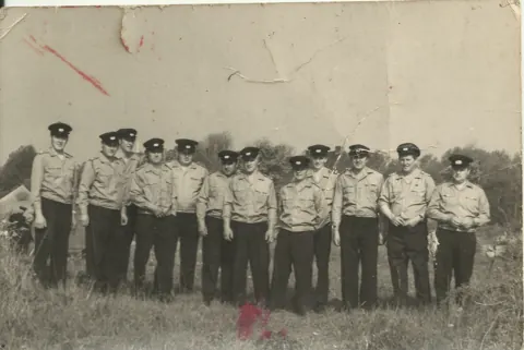 Die Feuerwehr auf einem Gruppenbild